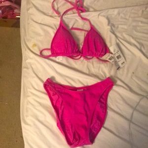 Christina pink bikini size small top and small bottoms.